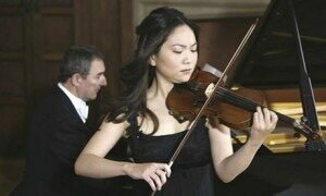 Min-Jin Kym plays her antique Stradivarius violin. Photograph: National News and Pictures