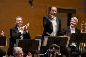 Manny Laureano the principal trumpet ( taking a bow) with "his shadow" second trumpet Robert Doer ( on his left) and principal trombone Doug Wright