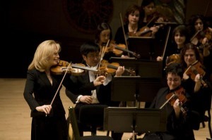 Emmanuelle Boisvert tuning the Detroit Symphony Orchestra