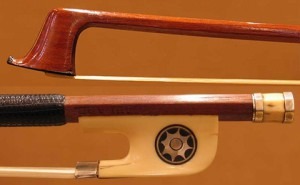 Violin bow by Francois Jude Gaulard, stick in pernambuco and frog in ivory with sun, 1820/25