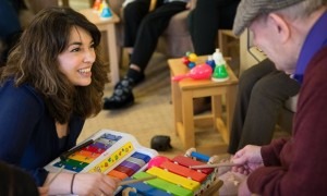 Camerata musician Amina Cunningham works with dementia patients in Manchester. Photograph: Ciara Leeming for the Guardian