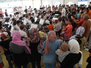 Neeta Yale CB Refugee Concert Wide Shot with Women