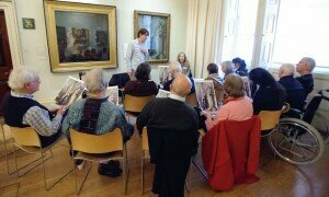 People living with dementia discuss art at a Royal Academy InMind session. Photograph: Roy Matthews