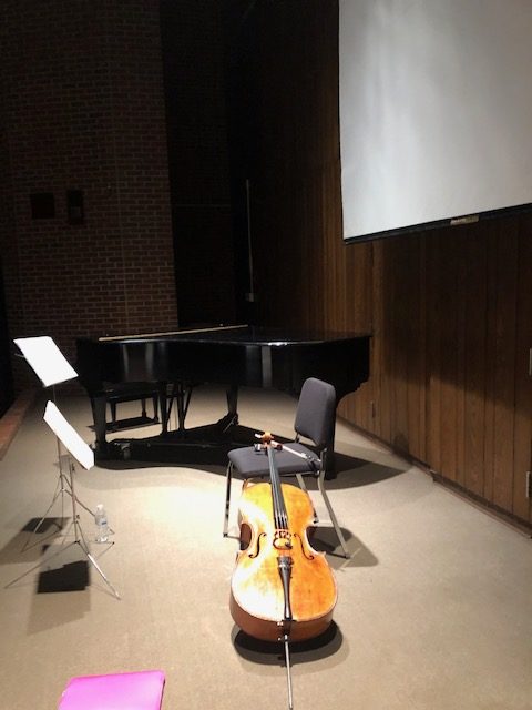 a cello waiting for the performance