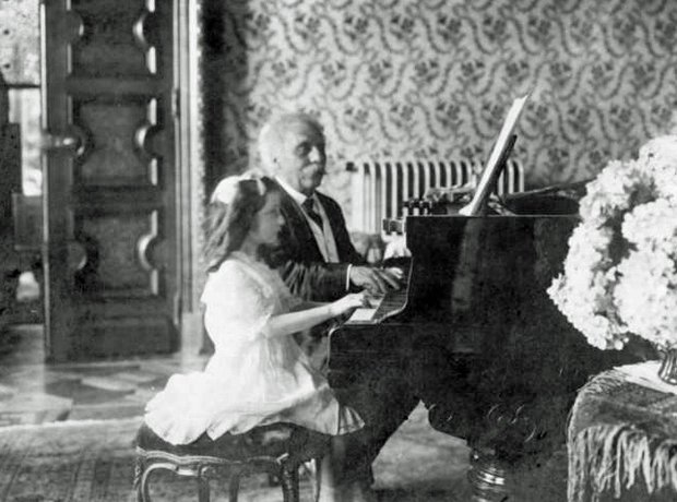 Gabriel Fauré at the piano with the young Melle Lombard, at Trevano, Lake Lugano.