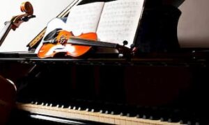 Piano, violin, and cello with scores
