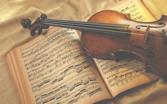 music sheets and violin