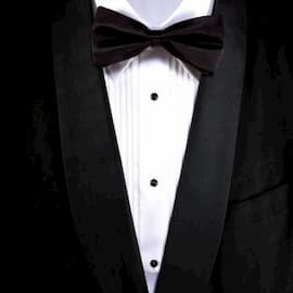 should conductors continue to wear the standard tux and tails in concerts?