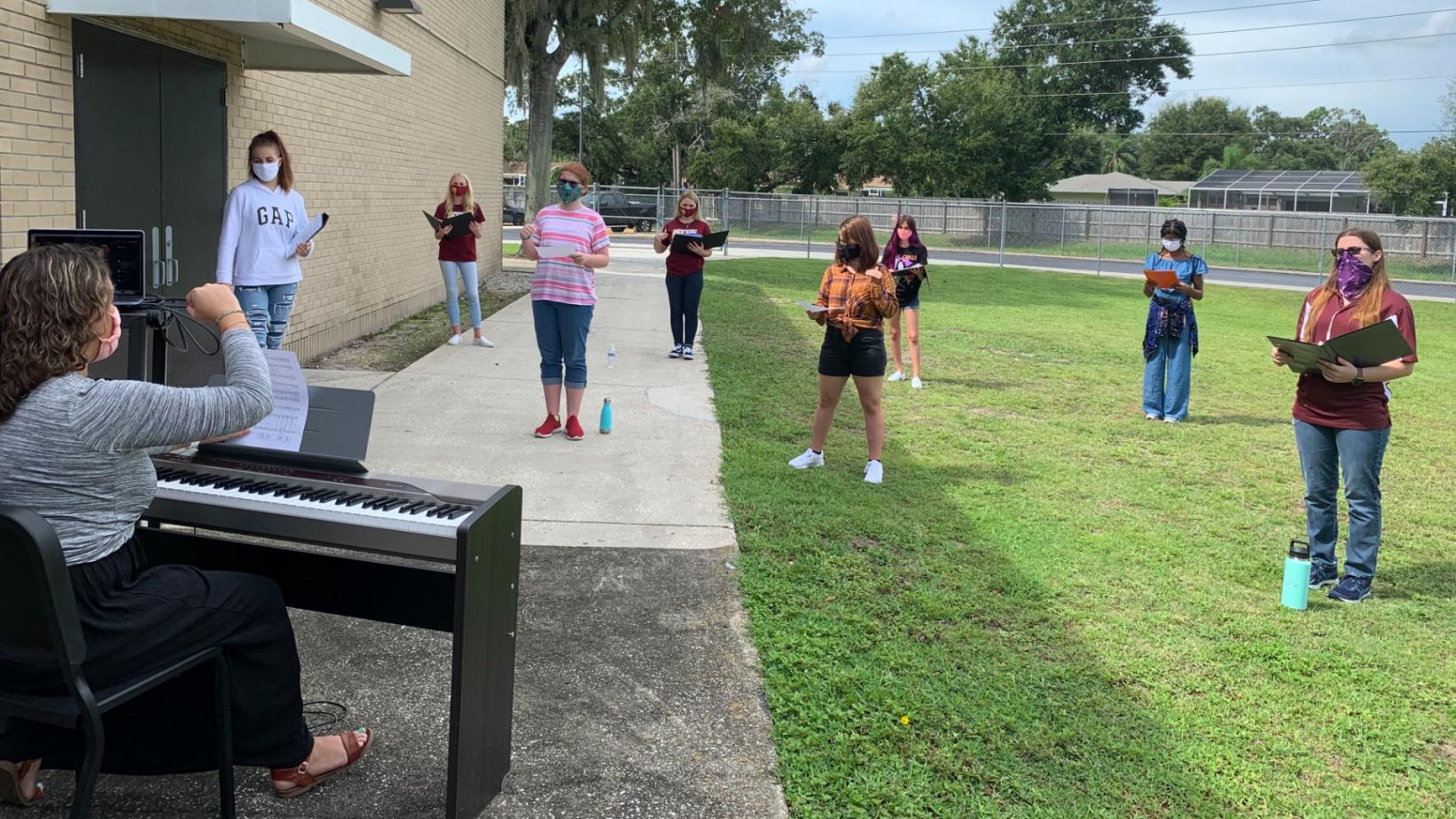 Chorus practices outdoors this year at countryside high school in Pinellas county, Florida.