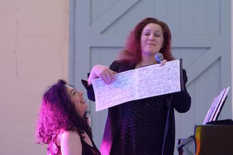 Tamara Anna Cislowska jokes with the audience about the hand-written score