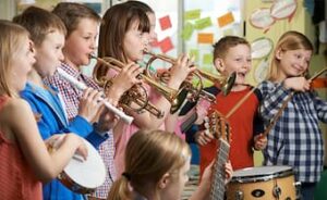 Group music lessons and classes encourage collaboration while also teaching children to appreciate their individual part in a larger ensemble