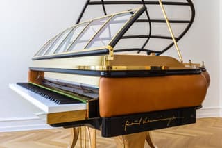 Grand piano designed by Poul Henningsen