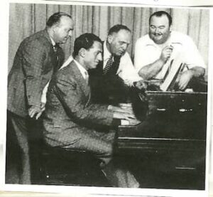 Grofe, Gershwin, SL Rothafel and Paul Whiteman at the Roxy Theatre, New York c.1930