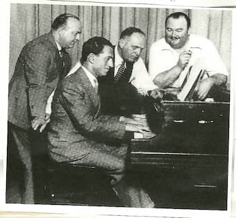Grofe, Gershwin, SL Rothafel and Paul Whiteman at the Roxy Theatre, New York c.1930