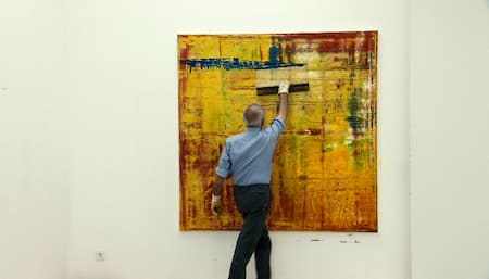 Gerhard Richter creating a squeegee work