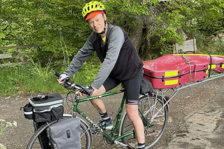 Cellist Kenneth Wilson, from Renwick, Cumbria, travelling with his cello in his bike ride