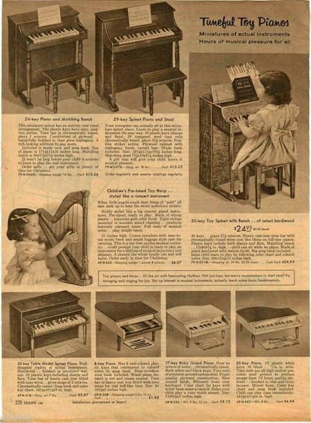Catalogue page with toy pianos and music