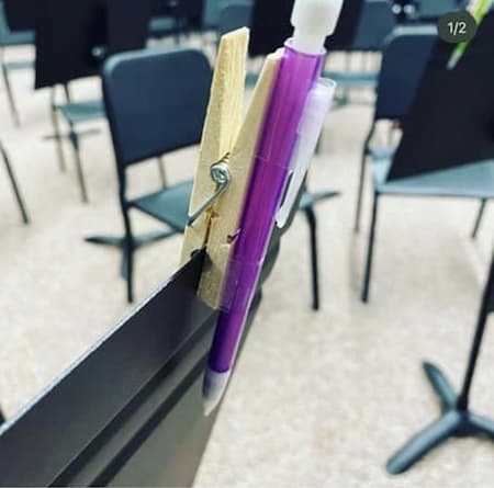 creative way to hold pencil on music stand