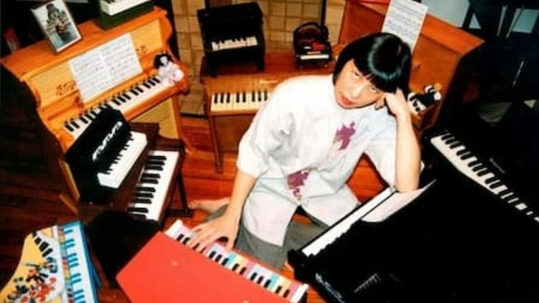 Margaret Leng Tan with toy pianos of all sizes
