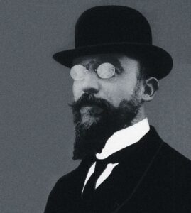 Composer Erik Satie with glasses