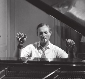 György Cziffra playing the piano with a cigarette in his mouth