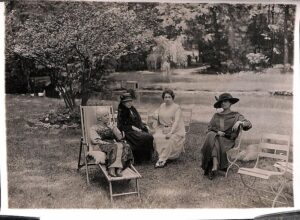 Composer Mel Bonis (on the Left in the lounge chair) enjoying a picnic with friends