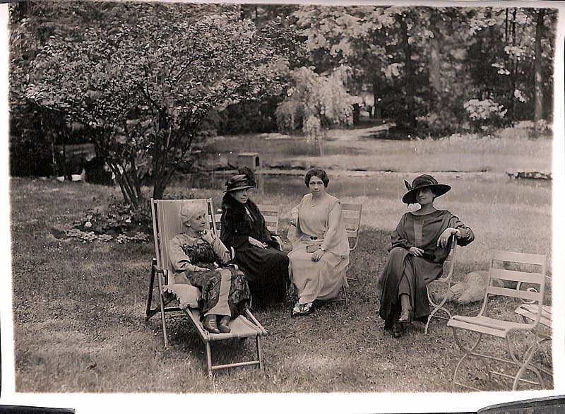 Composer Mel Bonis (on the Left in the lounge chair) enjoying a picnic with friends