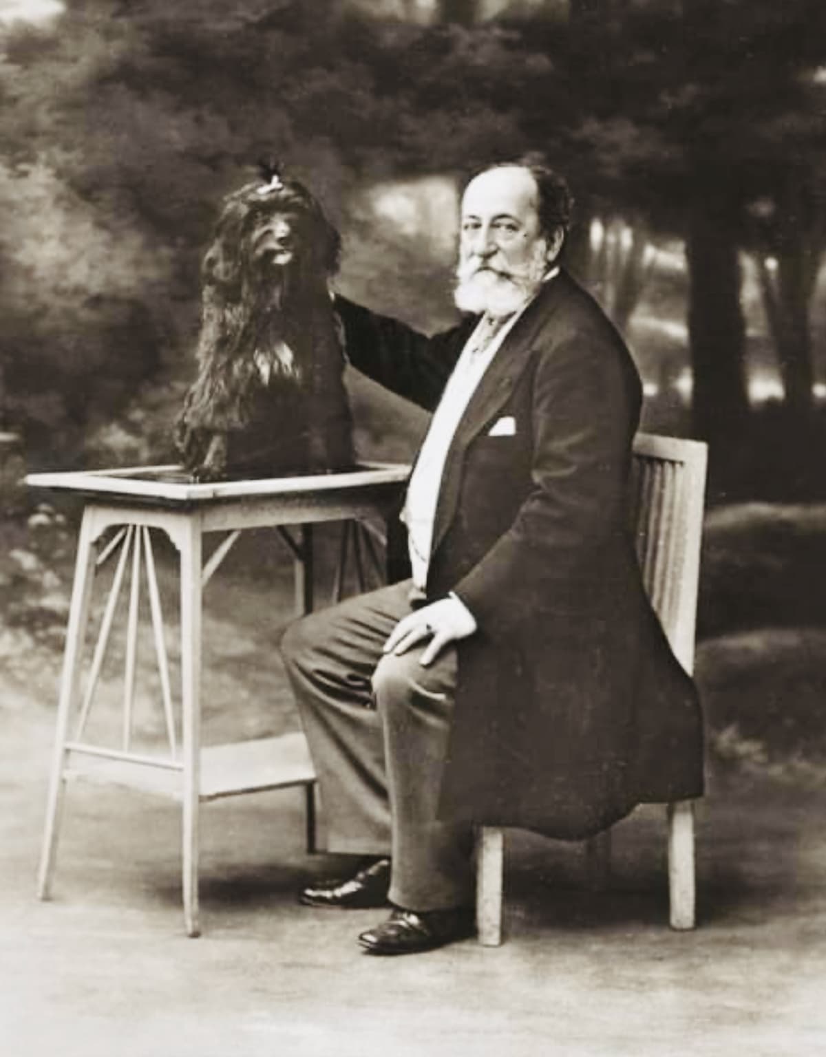 Composer Saint-Saëns with his dog Dalila