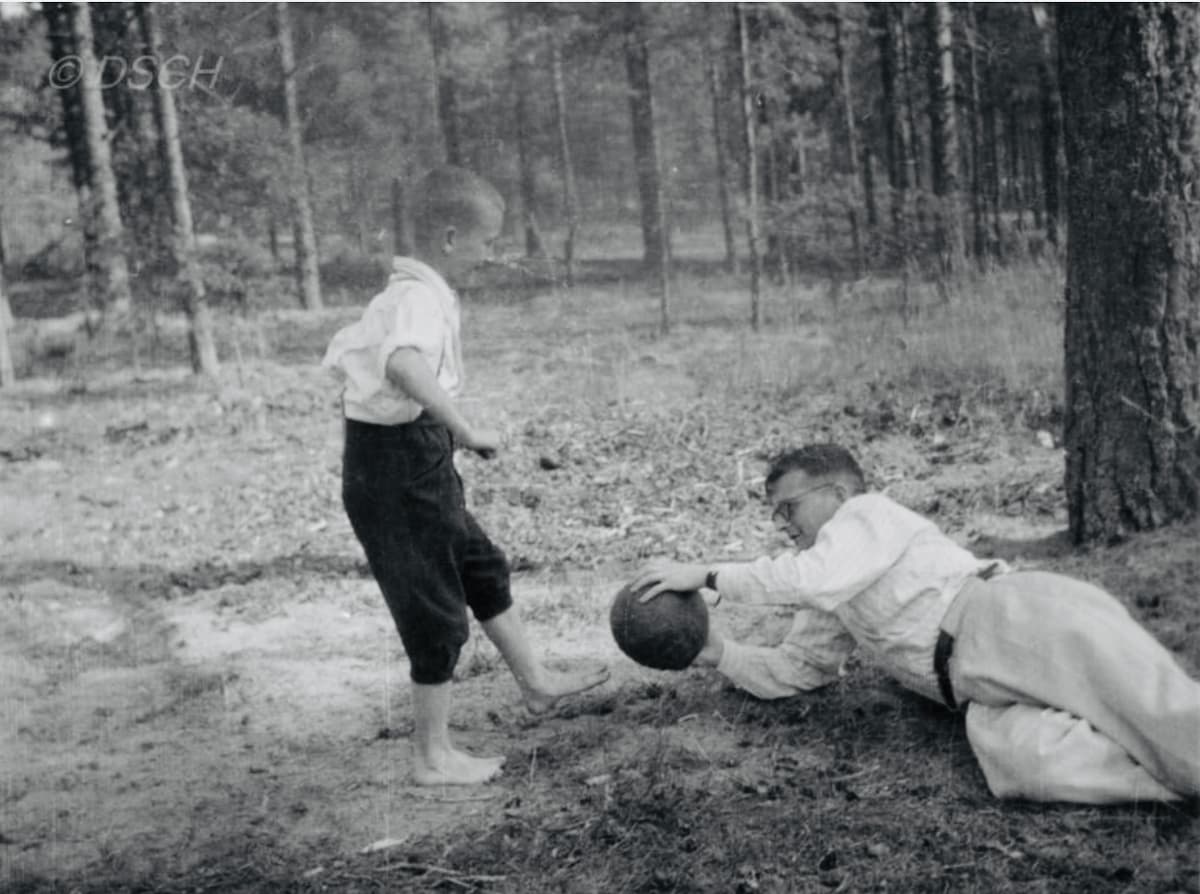 Composer Dmitri Shostakovich playing football with his son Maxim