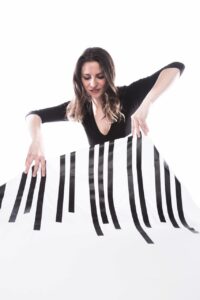 Photo of Dr. Brianna Matzke, pianist, educator, collaborator, producer, as well as an advocate of new music