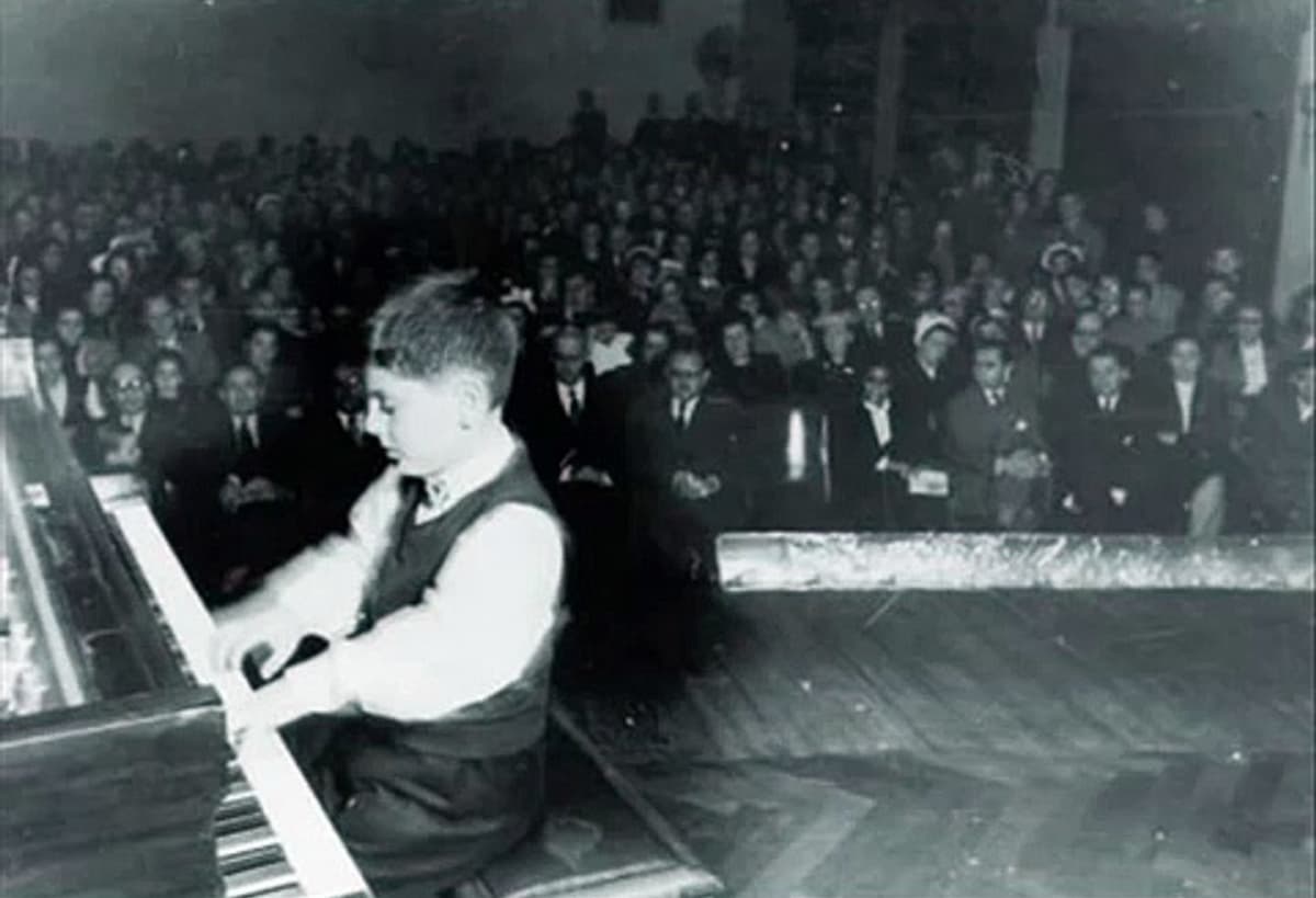 The young Daniel Barenboim performing at the piano