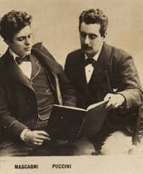 Photo of Pietro Mascagni and Puccini reading a book