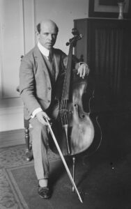 black and white photo of Pablo Casals with his cello