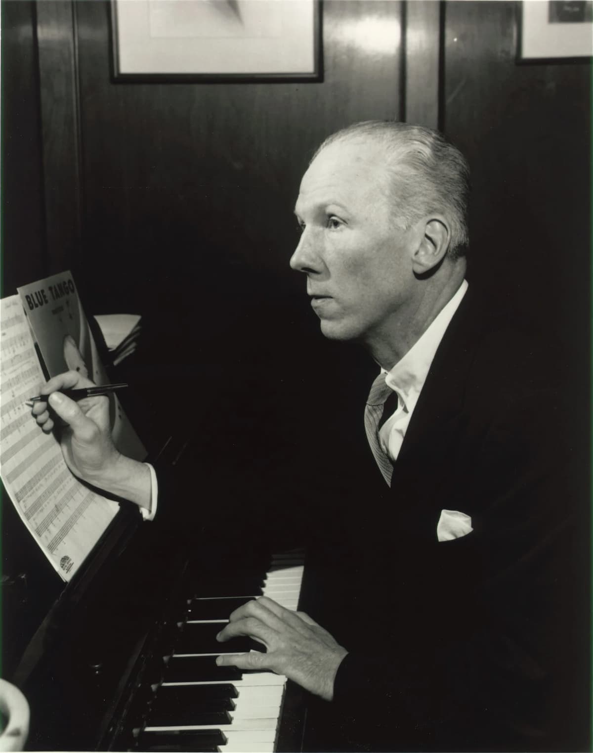 Leroy Anderson composing at the piano