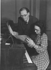 Yvonne Loriod and Olivier Messiaen looking at a music score