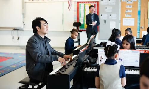 Lang Lang has set up piano labs in 86 US schools, giving 70,000 children access to keyboards. Photograph: The Lang Lang International Music Foundation.