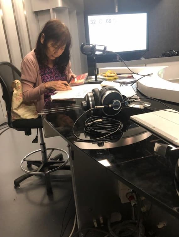 Nancy Loo preparing for her radio program