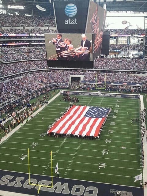Ryan and the Dallas Symphony Brass Section perform the National Anthem prior to the Dallas Cowboys game on Thanksgiving day 2012