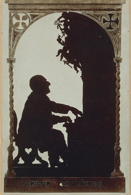 Silhouette of Anton Bruckner playing the organ