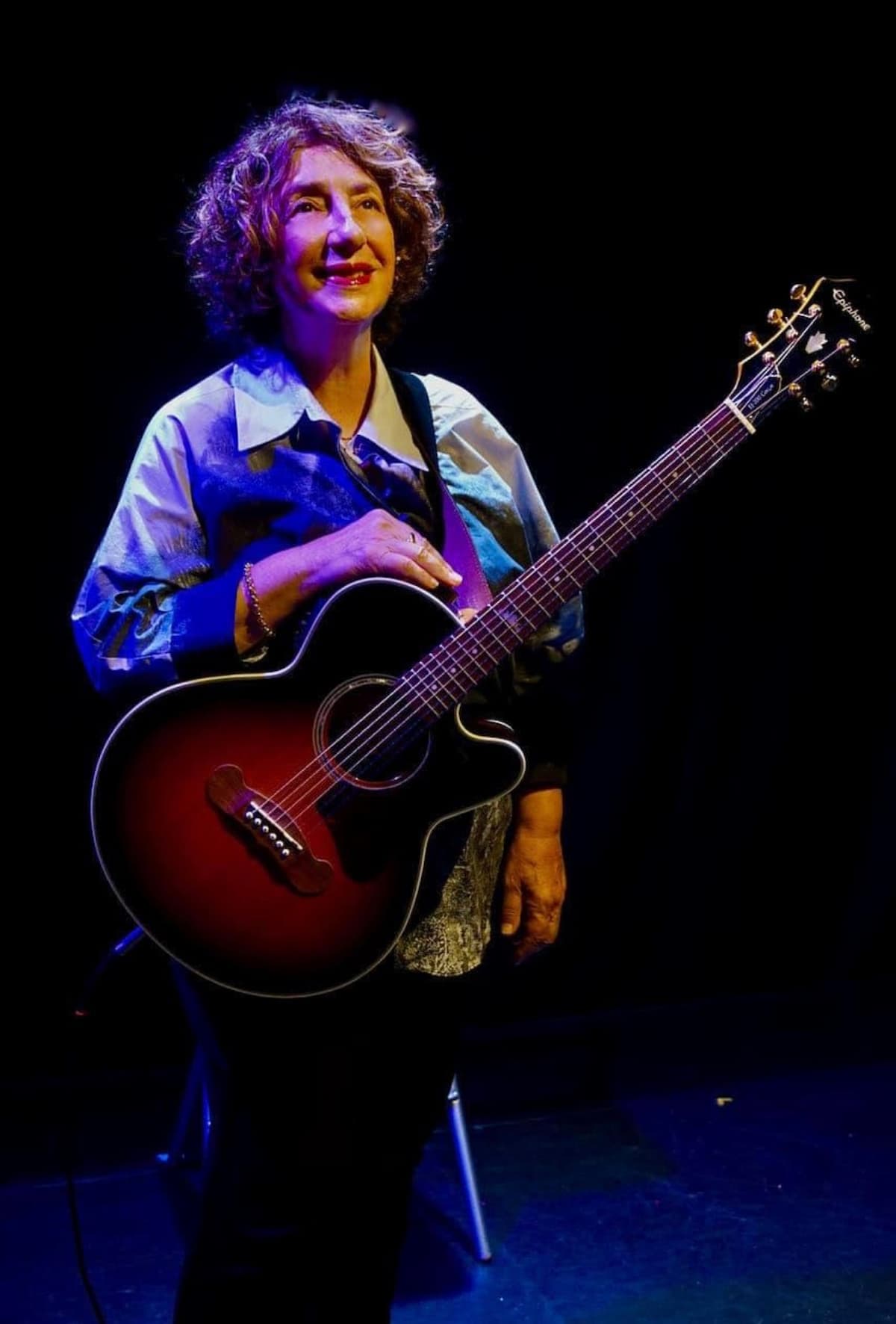 Deb Filler with her guitar