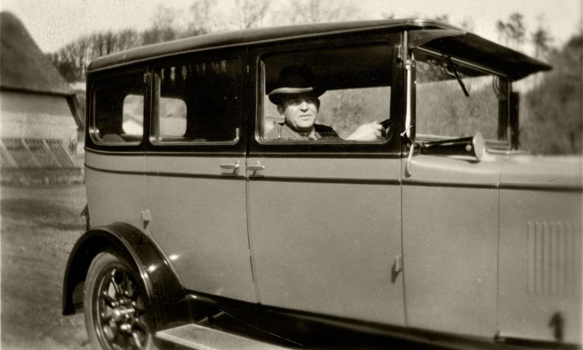 Carl Nielsen in his Morris, 1928