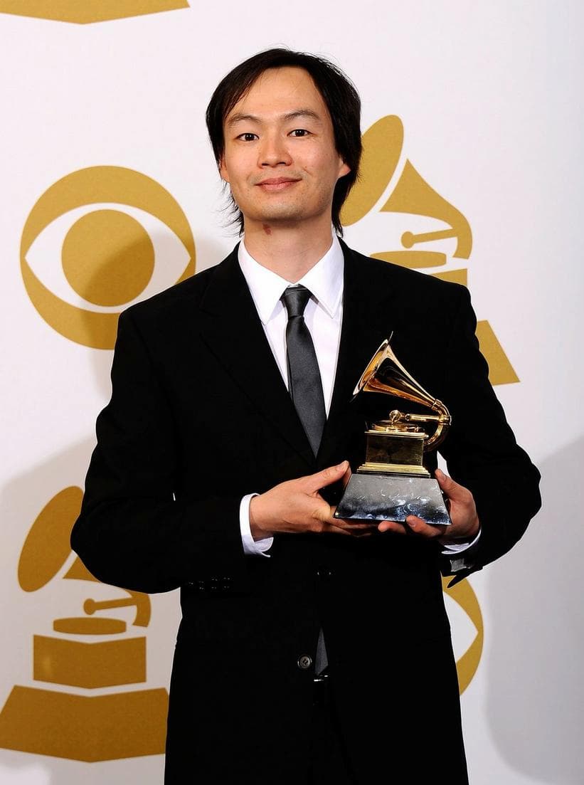 Christopher Tin winning a Grammy for Best Instrumental Arrangement Accompanying Vocalist(s), 2014)