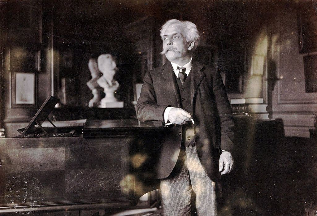 Dornac: Fauré, next to the piano in his flat in the boulevard Malesherbes, Paris, 1905
