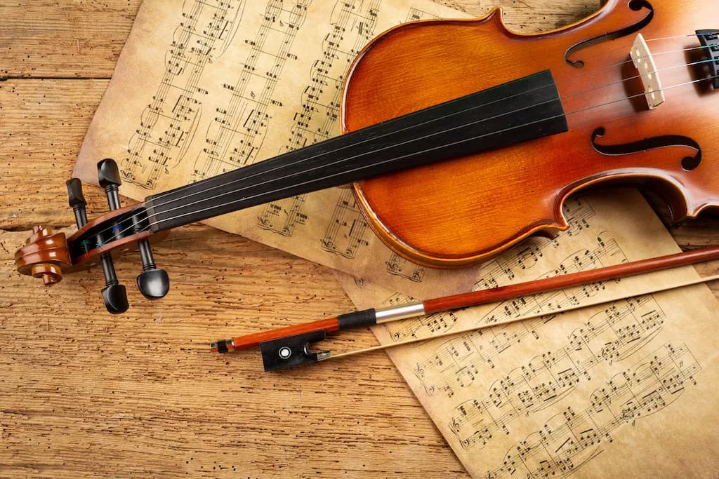 violin and antique music score