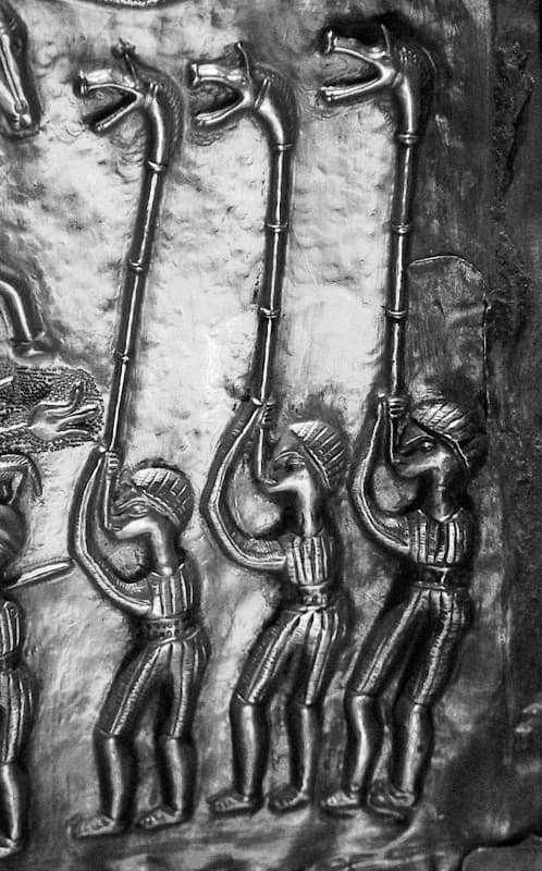 Three carnyx players depicted on plate E of the Gundestrup cauldron (detail), Denmark, ca 200 BC