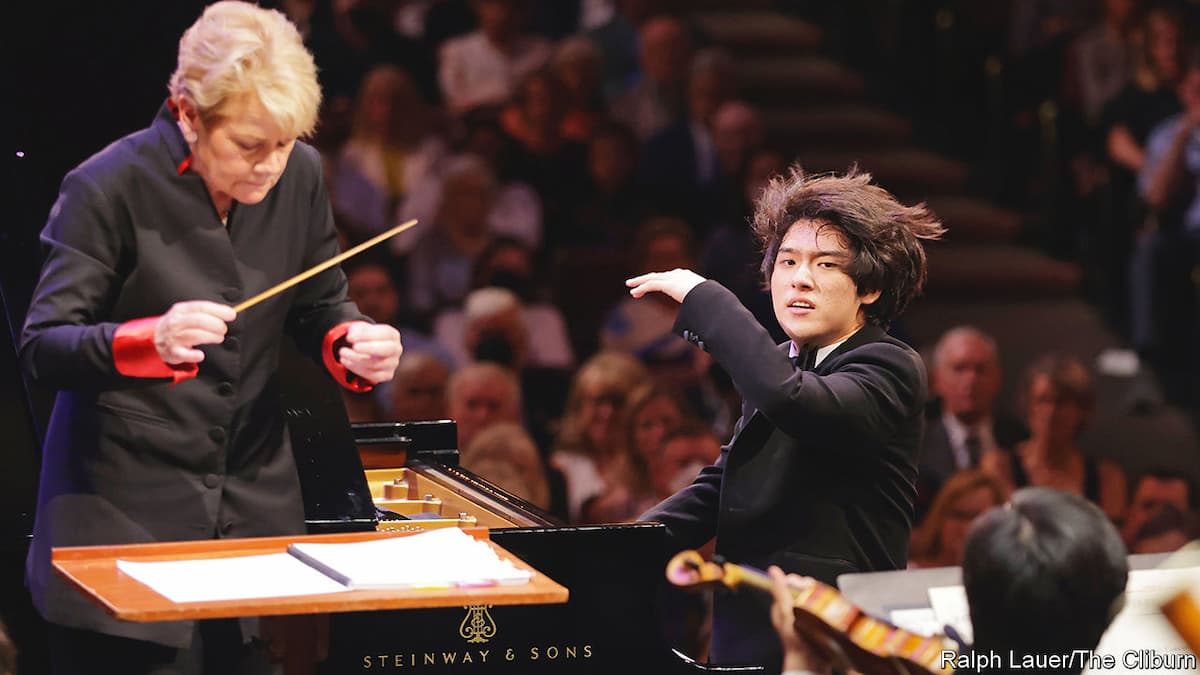Yunchan Lim playing at the Van Cliburn Competition, with Marin Alsop as the conductor