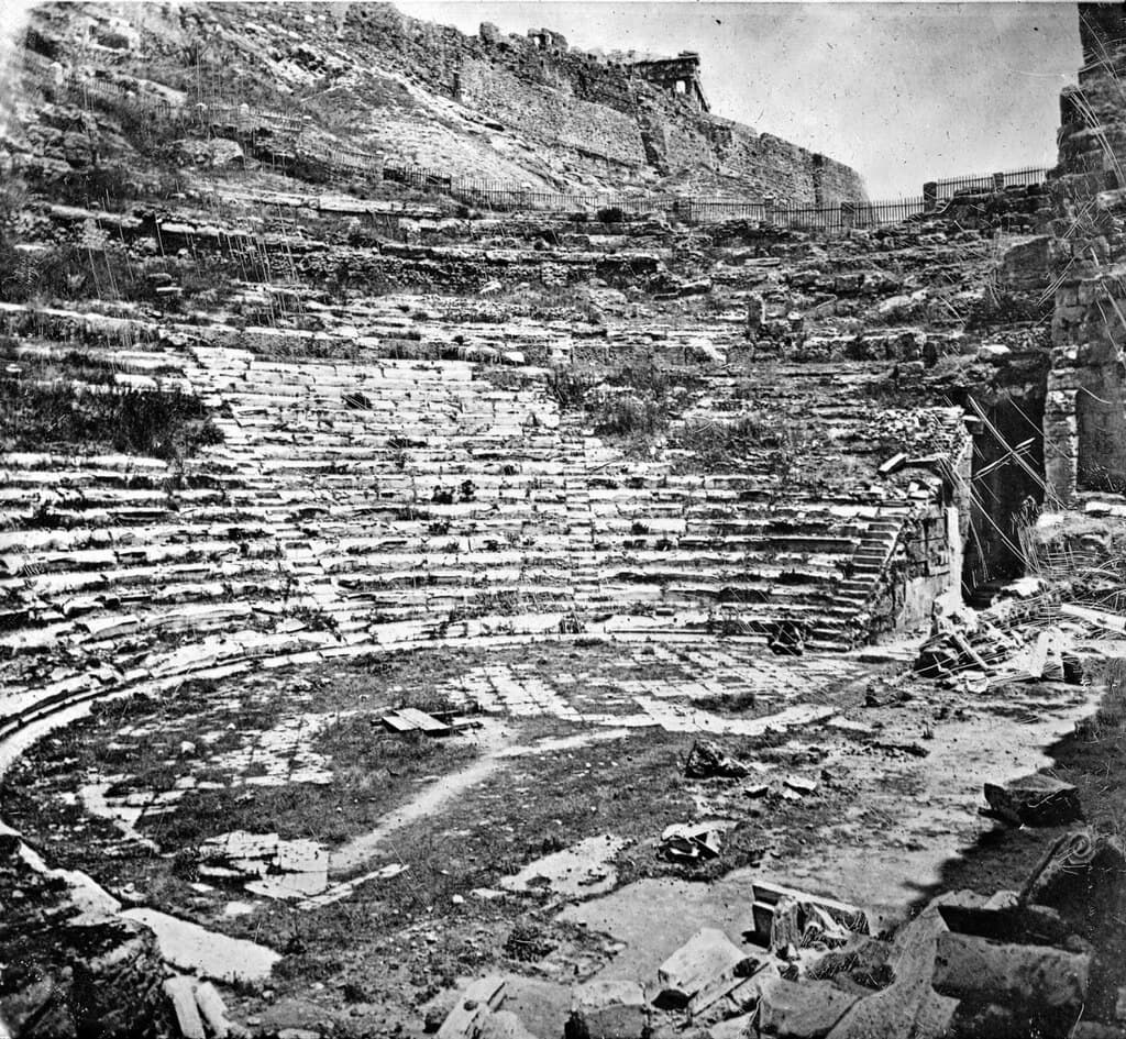 Odeon of Herodes Atticus in 1880 (note corner of Parthenon at upper right) (Brooklyn Museum)