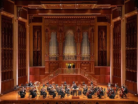 Pipe Organ with standing page tuner and stop puller, 2021 (Royal Opera House Muscat) (Photo by Khalid al-Busaidi)