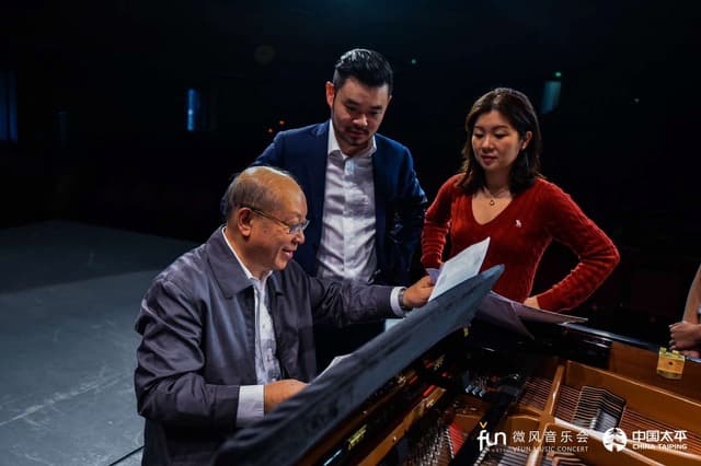 Vivian and her husband, Prof. Jay Sun, and her father