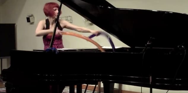 Kathleen Supove performing Dunaway’s Piano with Balloons, 2012